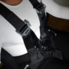 Sim racing harness – fastened central buckle Fastened harness with shoulder and lap straps meeting at the central buckle