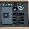 REACTOR Motion PRO – unboxing, first layer Open REACTOR Motion PRO box with control unit, cables and accessories in protective foam
